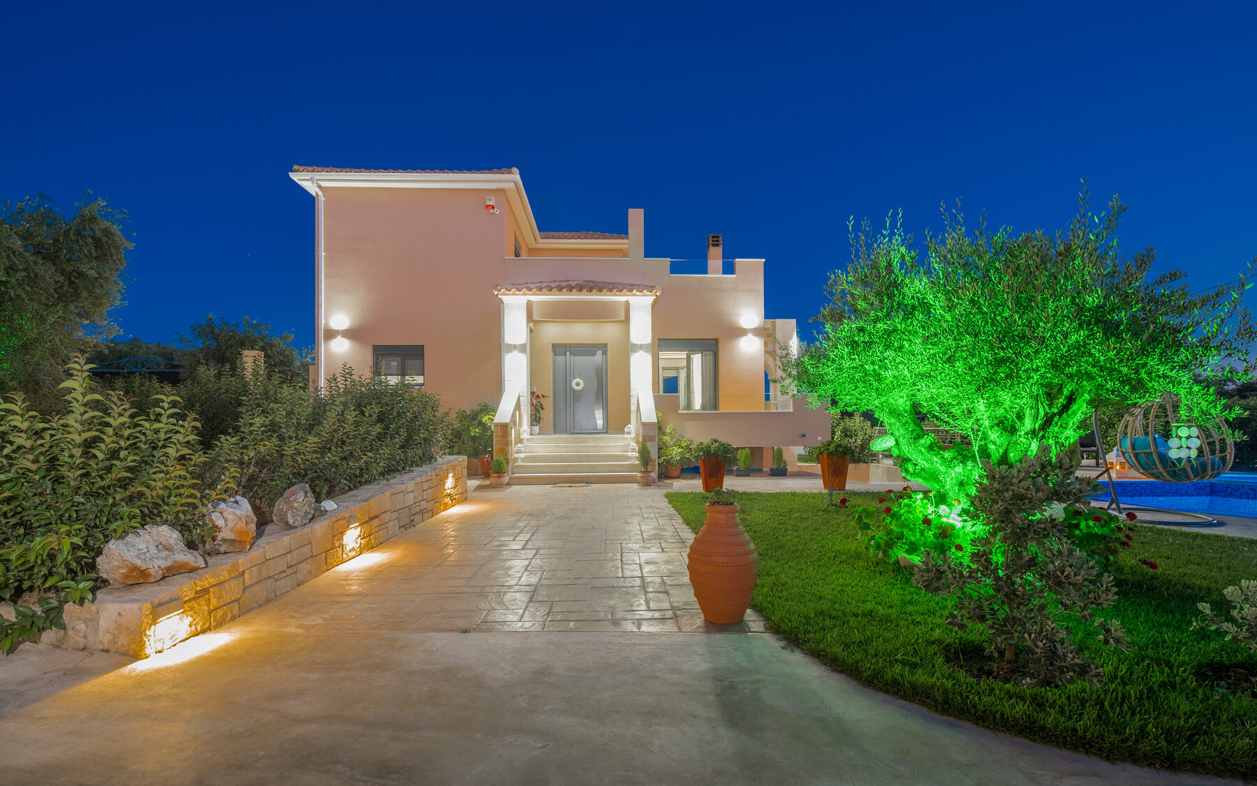 Zakynthos villa Kalamaki facade at dusk, Romanza Villa I